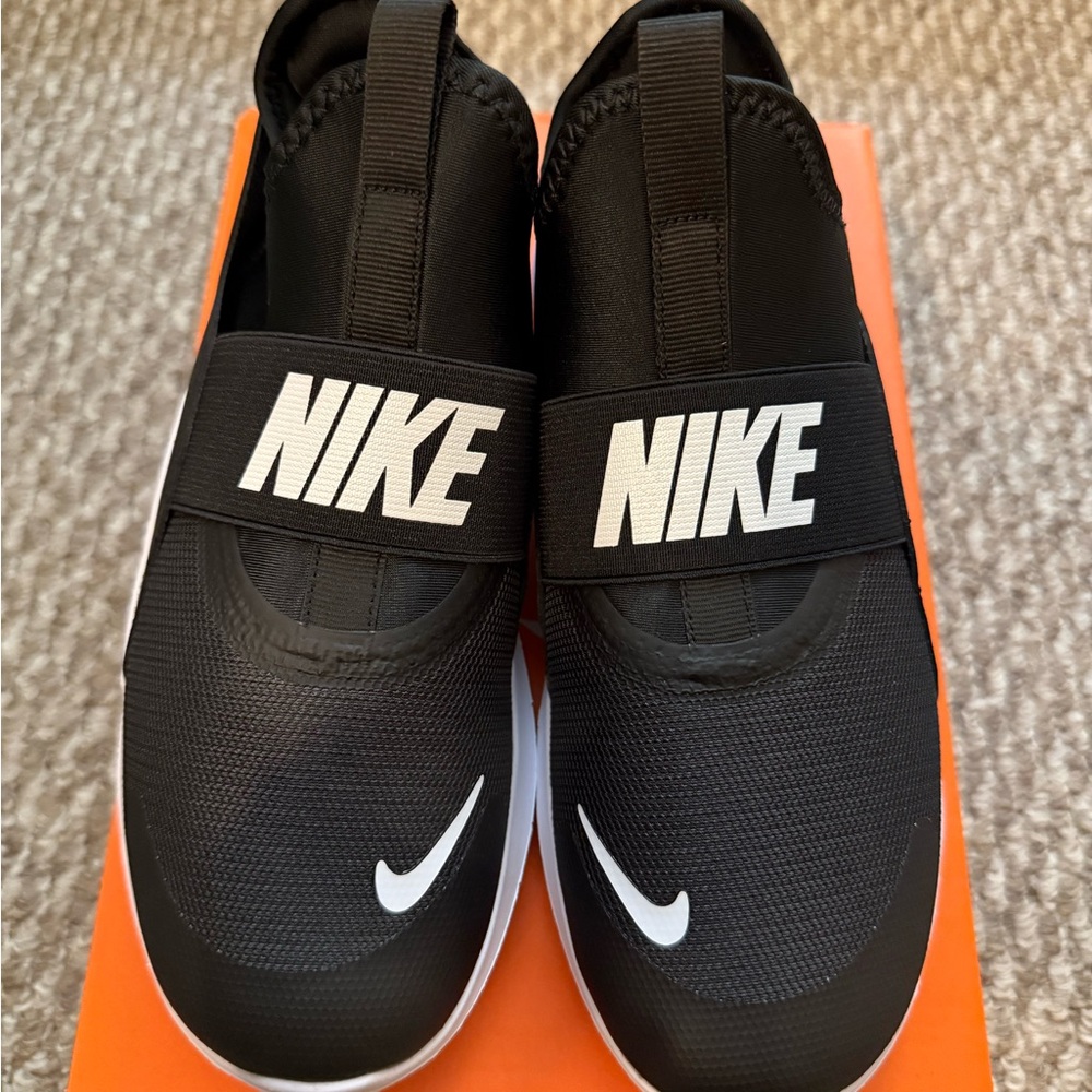 Nike Black and White Slip-On Sneakers
